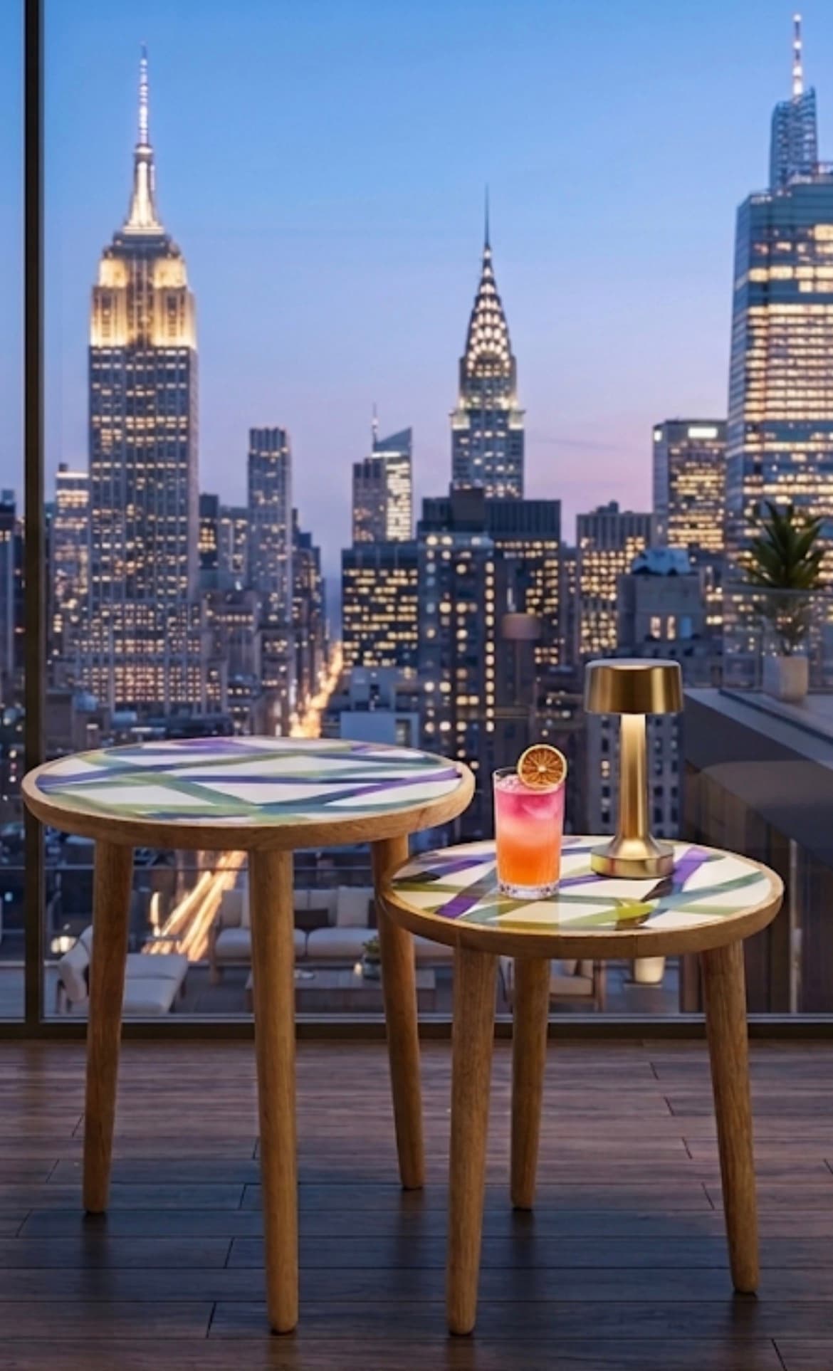 Abstract brushstroke nesting side tables set against cityscape backdrop