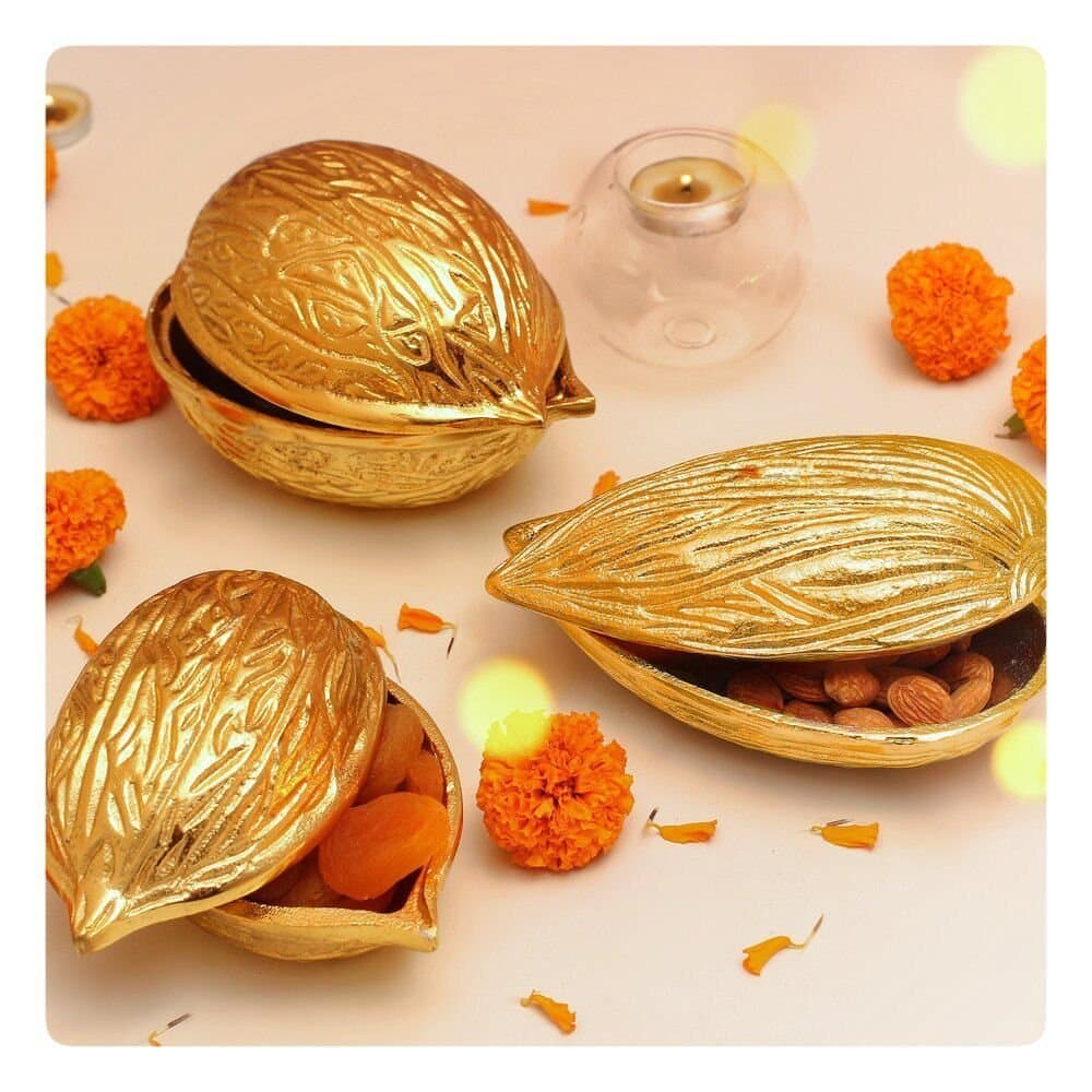 Brass walnut and almond dry fruit boxes with saffron and apricots